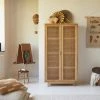 Tikamoon Armoire Enfant En Orme Massif Et Cannage 2 Tikamoon Armoire Enfant En Orme Massif Et Cannage -Maisons du Monde boutique armoire enfant en orme massif et cannage